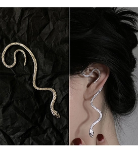Macro view of silver snake ear cuff with pave crystals and model wearing demonstration