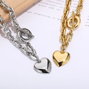 Golden and silver heart pendant necklaces with OT buckle in chunky chain style
