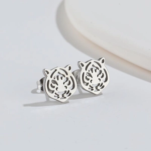 Minimalist stainless steel tiger stud earrings featuring hollow-out animal head design