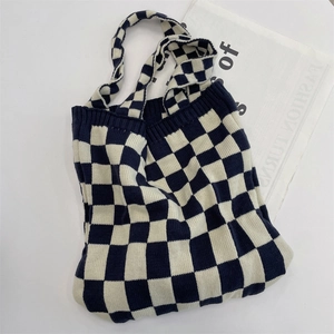 Detailed knit texture and black and white checkerboard pattern on casual tote bag