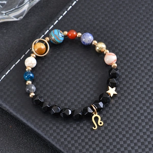 Solar system beaded bracelet featuring Leo zodiac sign and golden star pendant