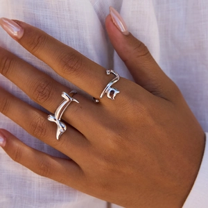 Polished stainless steel adjustable cat and dog open rings worn on fingers