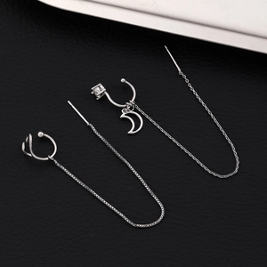 Detailed view of silver zircon moon earring set with ear cuffs and long tassels