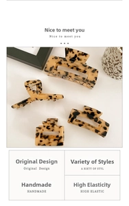 Detailed set of four tortoiseshell acetate hair claws in various geometric shapes