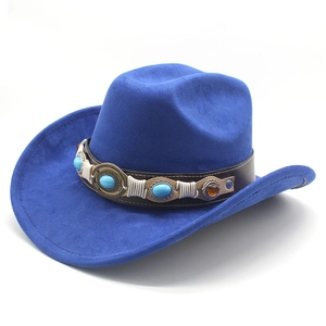 Close-up of blue suede cowboy hat featuring a turquoise stone and metal decorative band