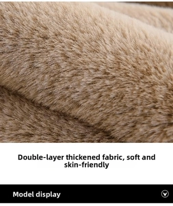 Close-up of brown thick plush fabric showing soft and dense double-layered texture