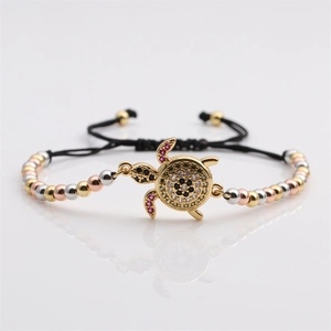 Adjustable turtle bracelet with tri-color metallic beads and colorful zircon accents