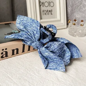 Floral denim fabric bow claw clip for women's hair styling, large blue shark clip accessory