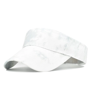Detail of white and gray tie-dye pattern on a sun visor hat with wide brim