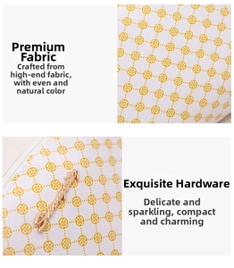 Close-up of Saffiano faux leather texture and gold metal clover logo on white handbag