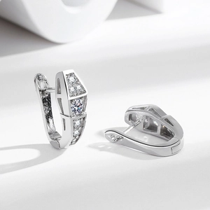 Elegant silver serpent earrings plated in 18K gold featuring sparkling zircon crystals
