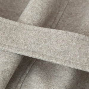 British style wool coat for women in beige featuring a tie waist belt and soft texture