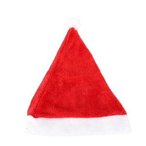 Classic red plush Christmas hat with white faux fur trim and pompom on white background