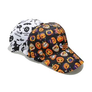 Detail of Halloween baseball caps with pumpkin and bat prints in black and white colors