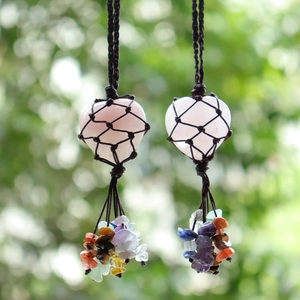 Handmade pink quartz heart pendant with colorful gemstone tassels and woven net