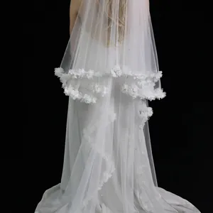 Elegant double-layered white bridal veil with handmade 3D floral petals and pearl accents