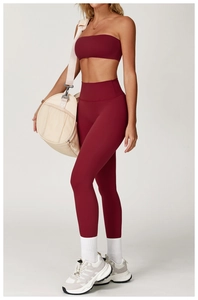 Two-piece wine red yoga set featuring a tube sports bra and high-waisted leggings