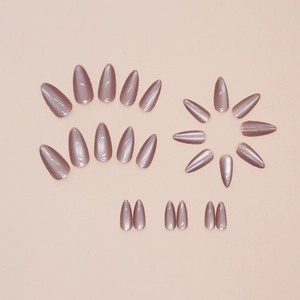 Metallic rose pink cat-eye stiletto press-on nails set with 24 pieces on beige background