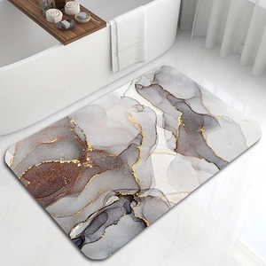Detail of marble pattern bathroom mat with gold accents in a modern white bathroom setup