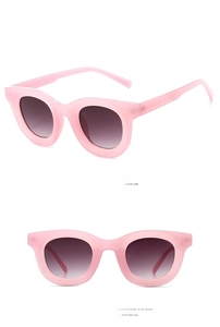Pink translucent round sunglasses with purple gradient lenses side and front view