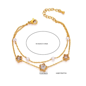 Detail of double-layer gold stainless steel bracelet with pearls and star charms