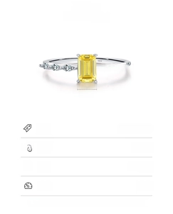 Macro view of S925 sterling silver ring with yellow emerald-cut stone and side diamonds