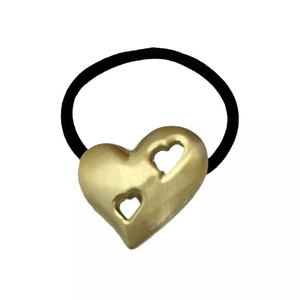 Vintage gold heart geometric hair tie with minimalist matte finish on white background