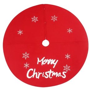 Red Christmas tree skirt with white Merry Christmas embroidery and snowflake patterns