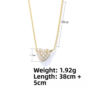 Detailed view of S925 silver heart necklace with zircon pave and 38cm+5cm gold chain