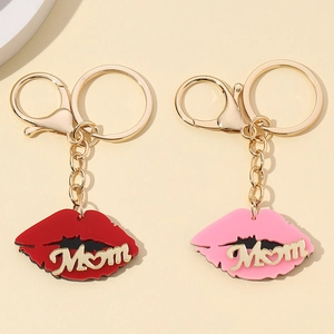 Lip shaped keychain with Mom lettering in red and pink for bag charm decoration