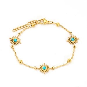 18K gold plated stainless steel bracelet with turquoise sunburst charms on white background