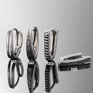 Four vintage silver stainless steel V-shaped earrings in various textured designs
