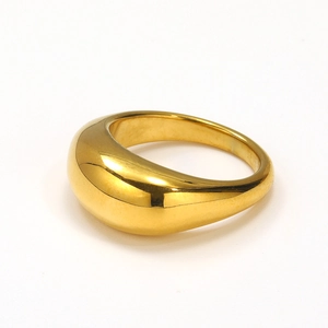 Detail of 18k gold plated stainless steel ring with hammered texture and convex design