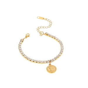 Gold tennis bracelet with sparkling zircon stones and Queen Elizabeth coin charm