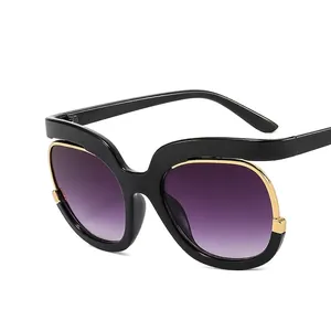 Fashion oversized sunglasses with black and gold frame and purple gradient lenses