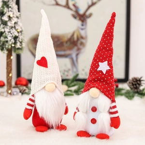 Charming red and white Christmas gnomes with knit hats and heart and star details