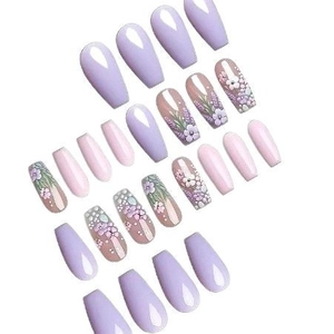 Pastel purple coffin nails with 3D embossed floral patterns and small pearl accents