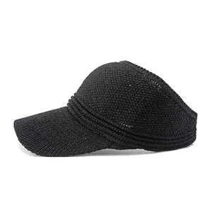 Minimalist black knit sun visor hat for women featuring a wide brim and breathable mesh