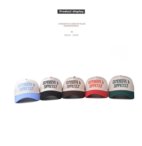 Front view of cotton baseball caps in five colorways with embroidered slogan detail