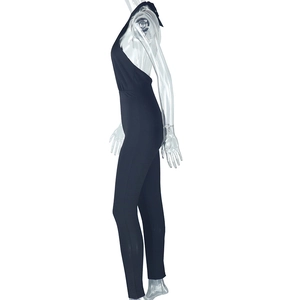 Detailed side view of black halter neck backless jumpsuit on a mannequin