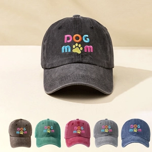 Detail showing various colors of washed cotton baseball caps with DOG MOM embroidery