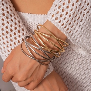 Minimalist layered geometric cross open bracelets in gold and silver metal tones
