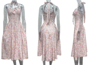 Detail view of the floral print halter neck summer dress with pink and yellow flowers