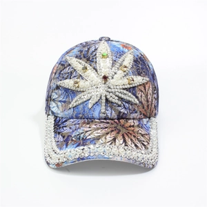Detailed view of colorful floral baseball cap with rhinestone and pearl leaf embroidery