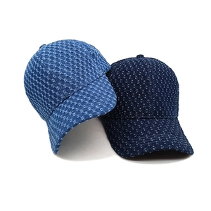 Frayed denim baseball caps in light and dark blue with star pattern embroidery