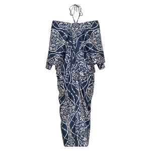 Blue bohemian halter neck maxi dress with white symmetrical floral patterns