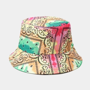 Reversible tie-dye paisley bucket hat with vibrant pink and yellow multicolor patterns