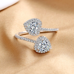 Elegant silver double heart open ring with sparkling halo-set cubic zirconia stones