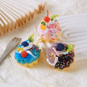 Artistic realistic fruit donut charms with strawberry and cream details on gold chains