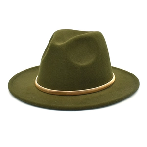 Detailed texture of army green wool felt fedora hat featuring golden metallic decorative band
